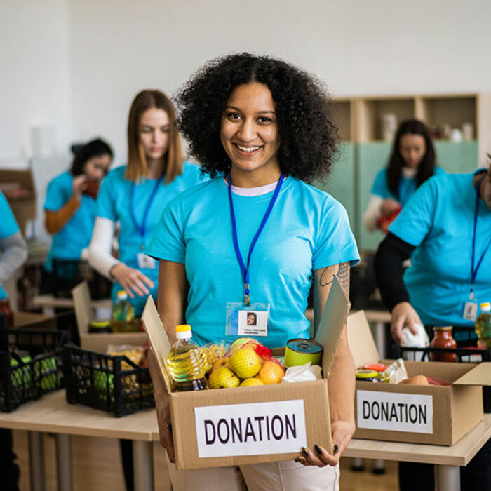 volunteer-with-donated-food.jpg